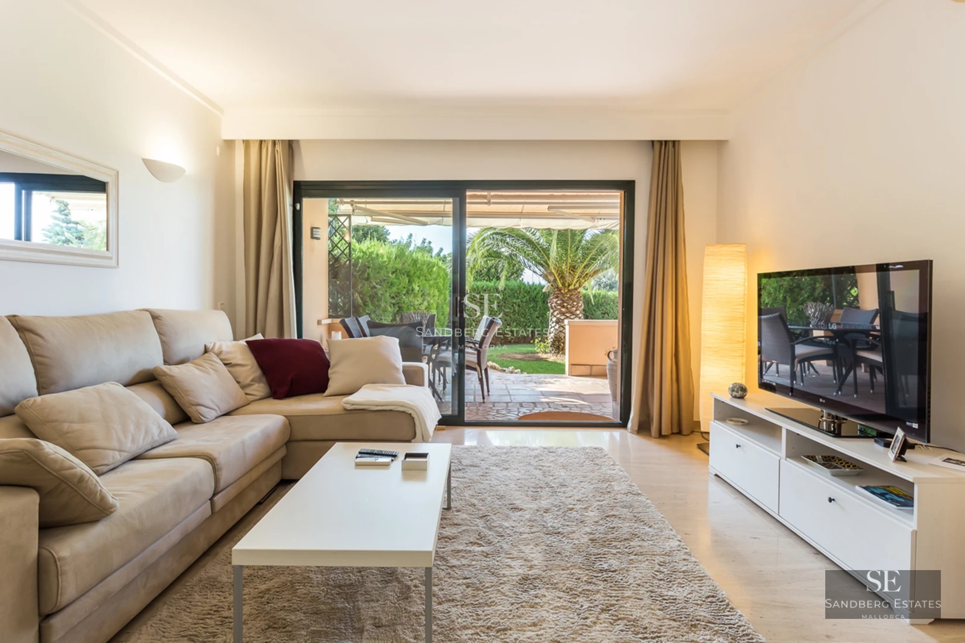 Exterior view of a modern villa featuring an infinity pool, lush greenery, and minimalist architecture. Sleek design with natural light.