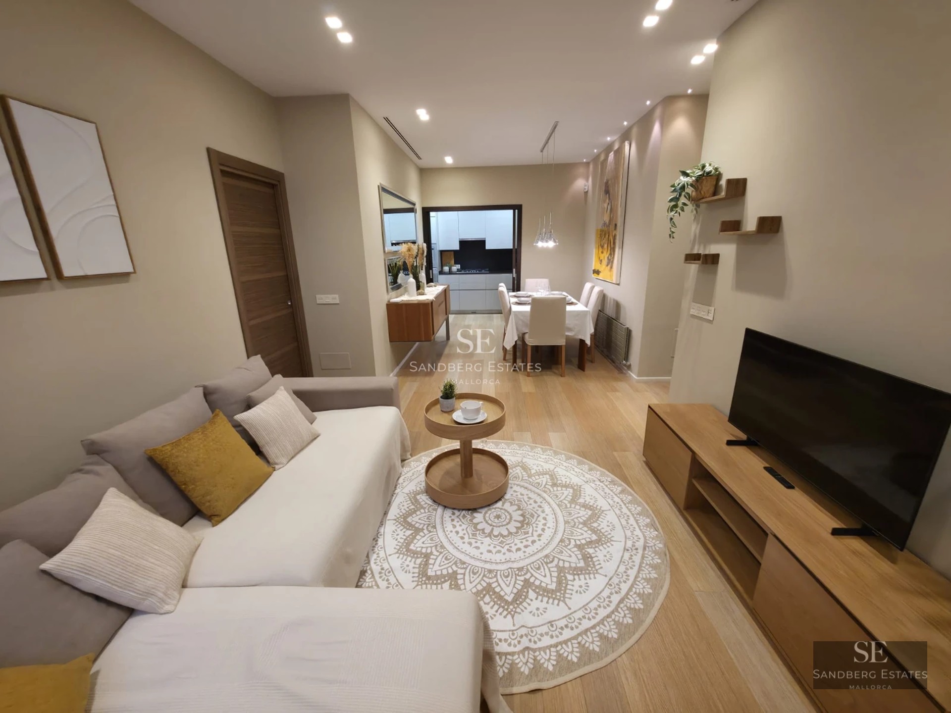 Exterior view of a modern villa featuring an infinity pool, expansive terraces, and lush garden. Minimalist architecture with large windows.