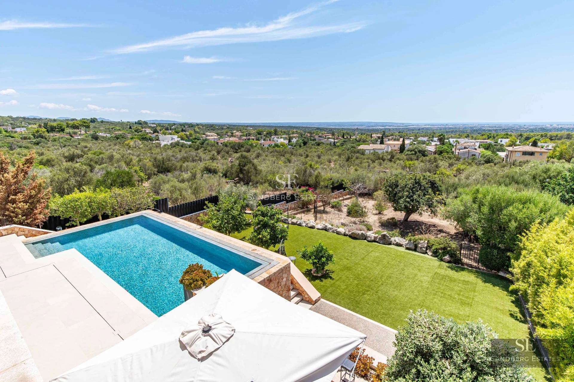 Infinity pool view. Modern design, recessed lights, and large relaxation area.