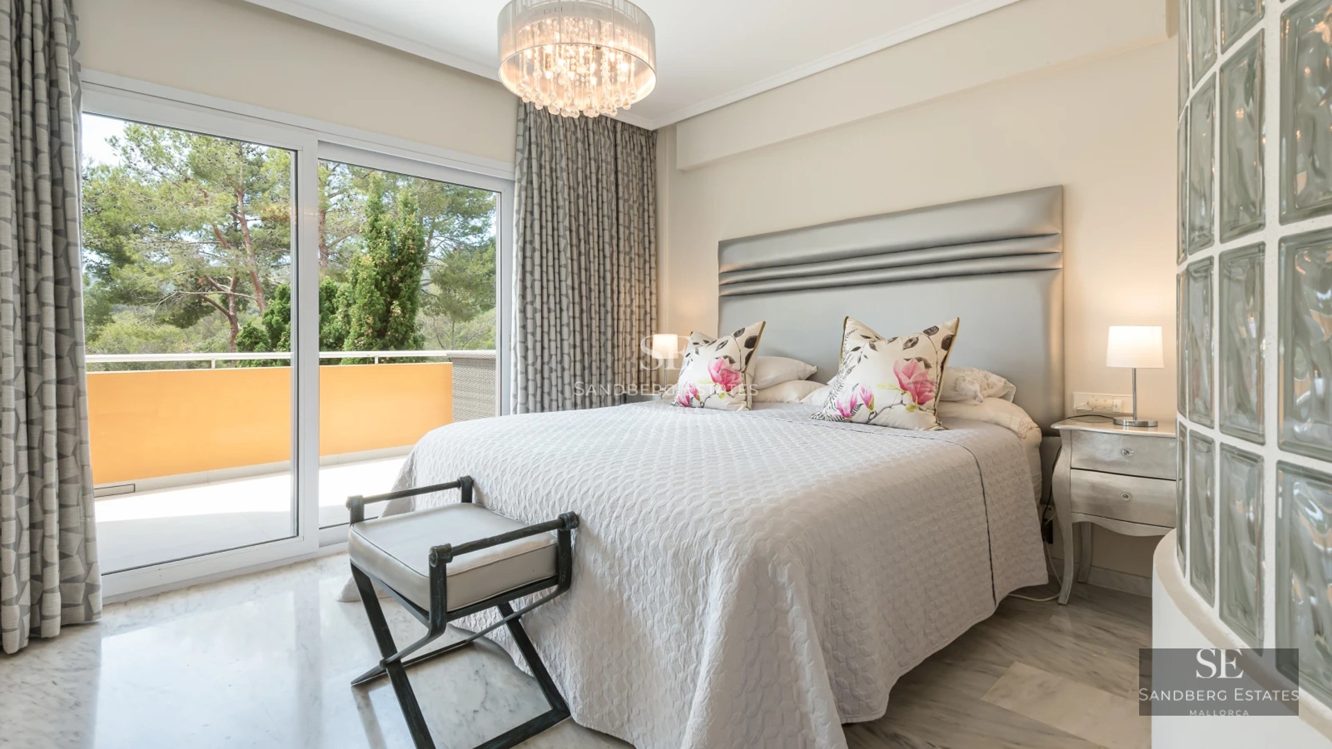 Spacious terrace with infinity pool, sun loungers, and sea view. Modern design with elegant finishes.