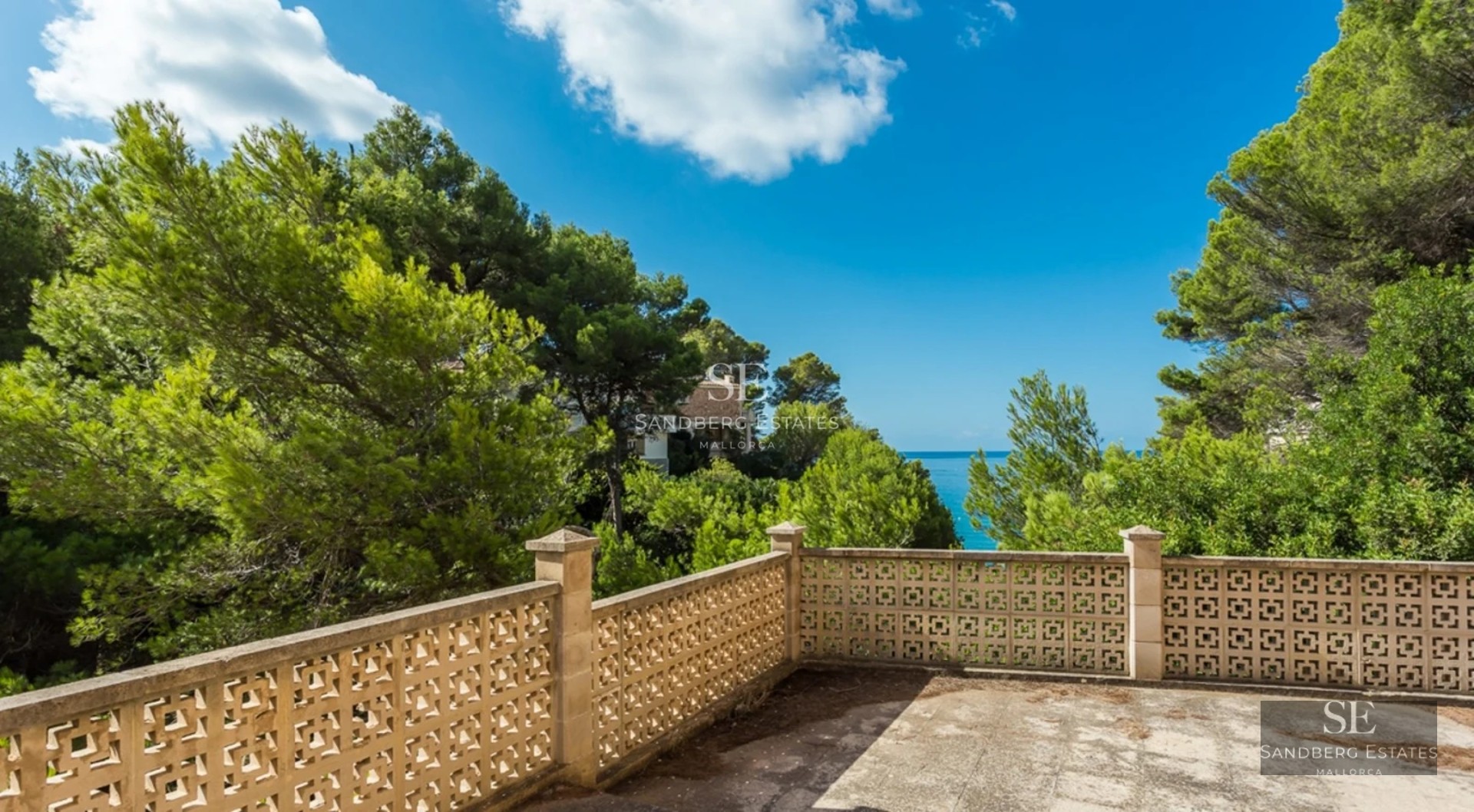 Spacious terrace with pool, sun loungers, and panoramic views. Modern design ideal for relaxation and outdoor entertainment.