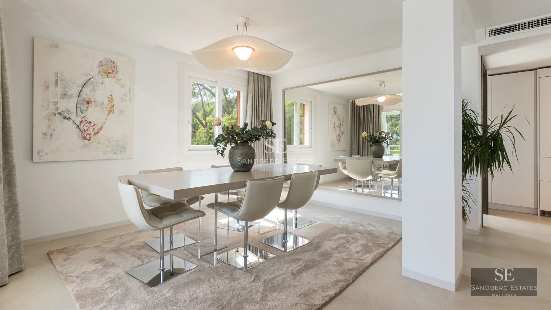 Exterior view of a modern villa with infinity pool, landscaped gardens, and expansive terraces. Minimalist design and natural light.