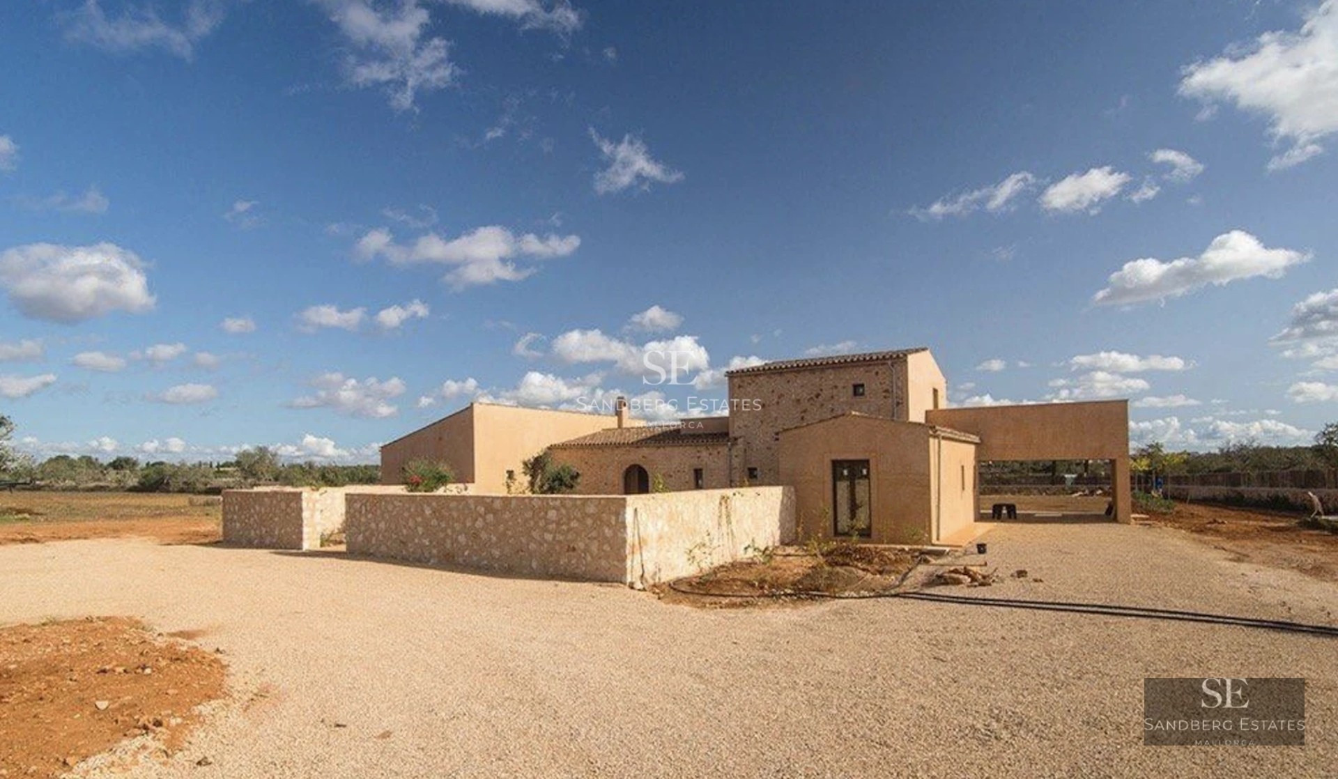 Spacious terrace with infinity pool, modern furniture, panoramic sea views, and minimalist architectural design.