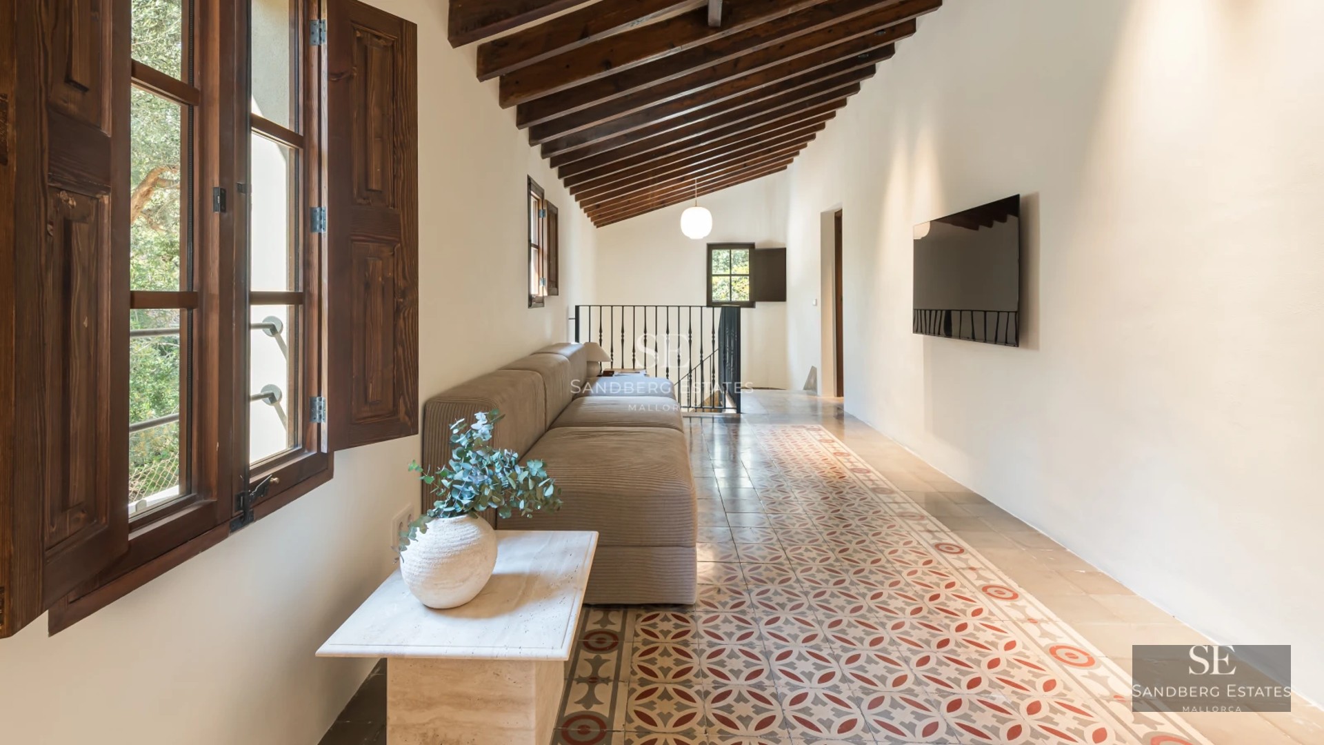 Panoramic view of a modern villa with a pool. Minimalist architecture, large windows, and lush vegetation.