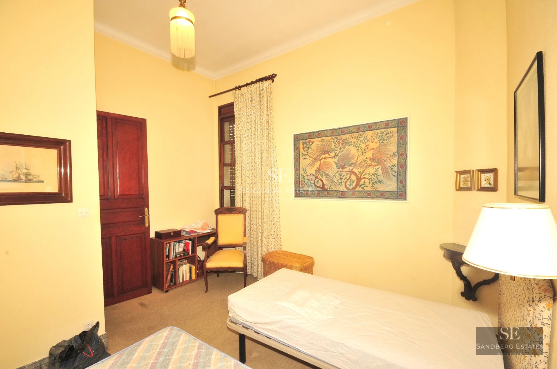 Spacious living room with panoramic views, large windows, modern furniture, and minimalist decor. Bright and elegant.