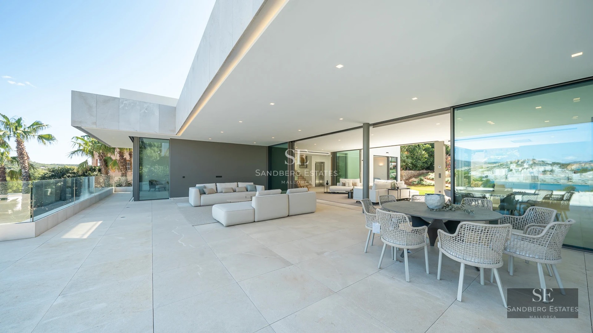 Exterior of a modern villa featuring an infinity pool. Minimalist design, large windows, and lush garden. Ideal for investors.