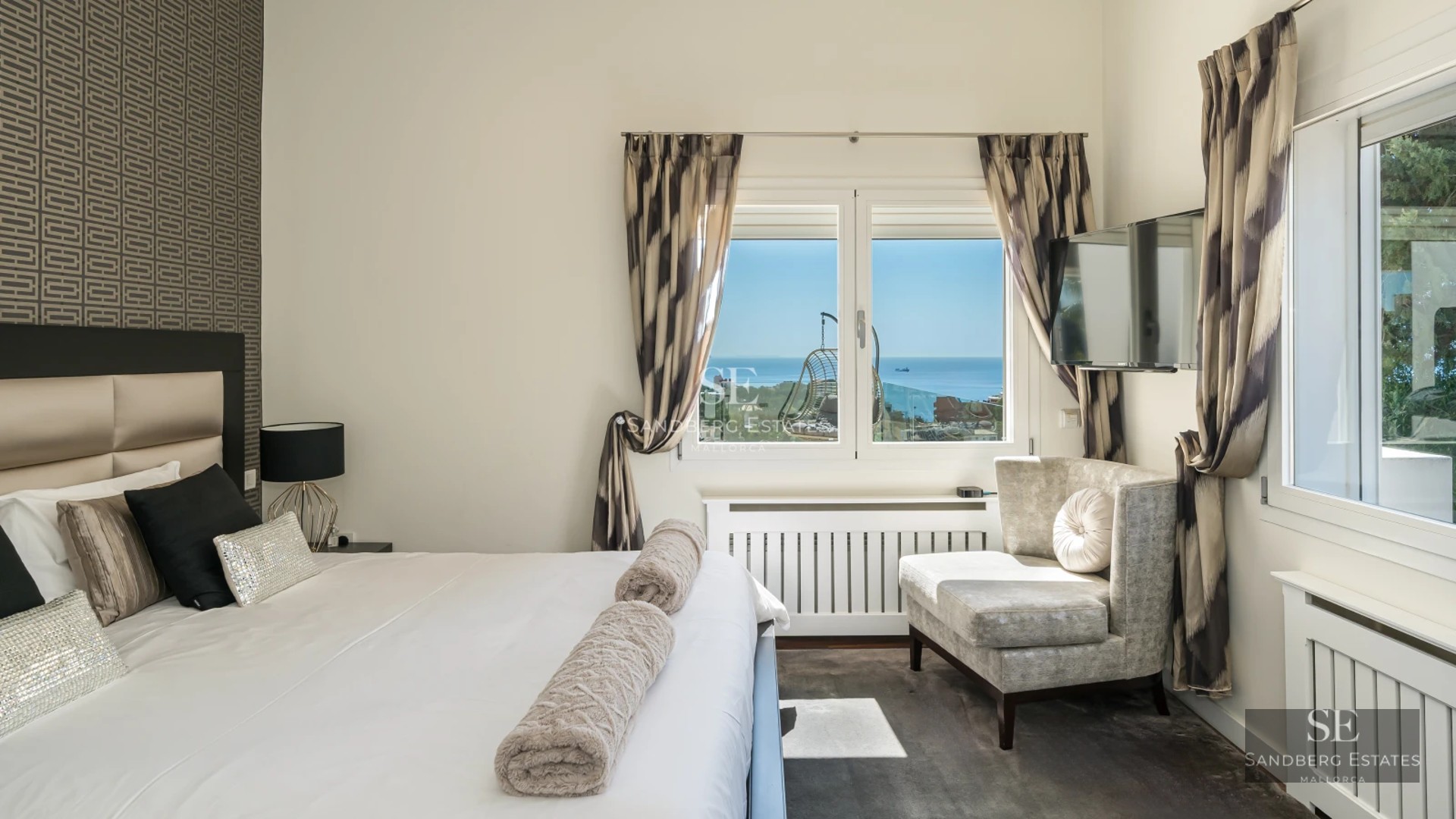 Exterior view of a modern villa with infinity pool, spacious terraces, and lush garden. Minimalist and elegant architecture.