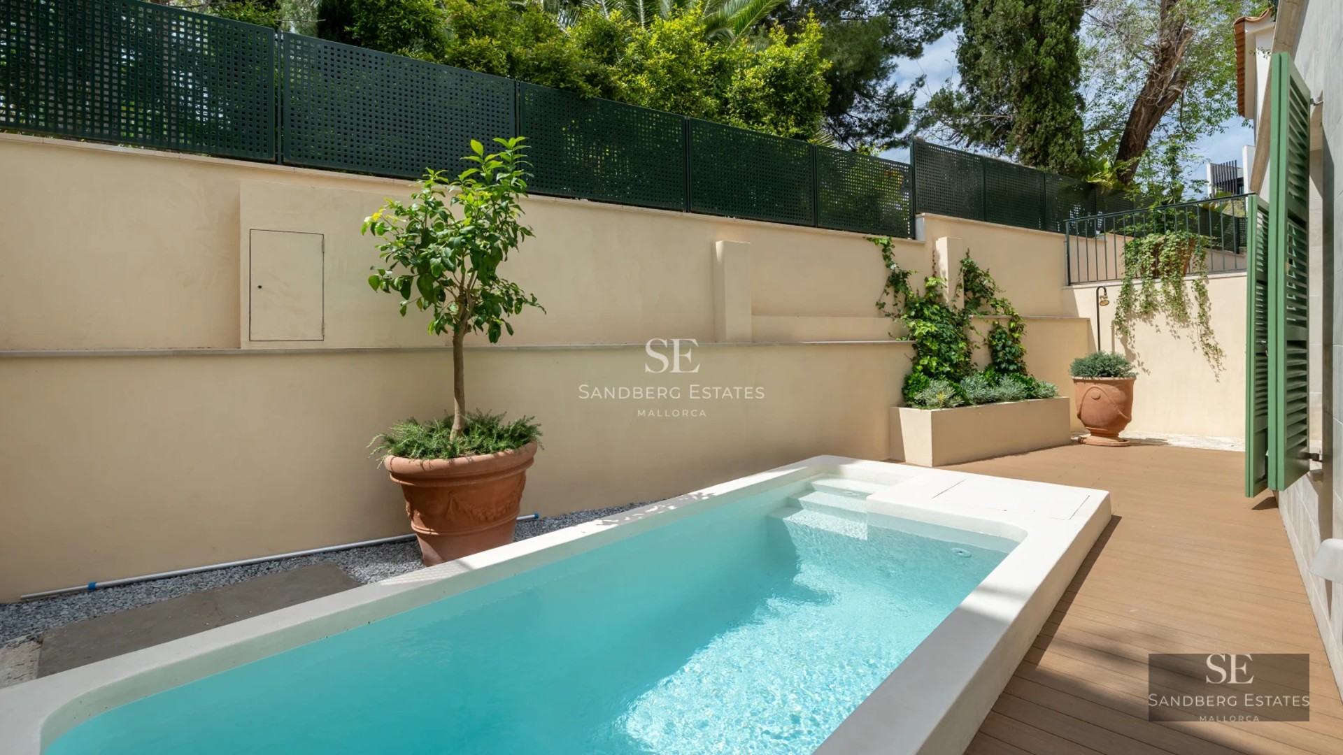 Spacious living room with balcony, sea views, and modern furniture. Bright and airy. Ideal real estate investment.