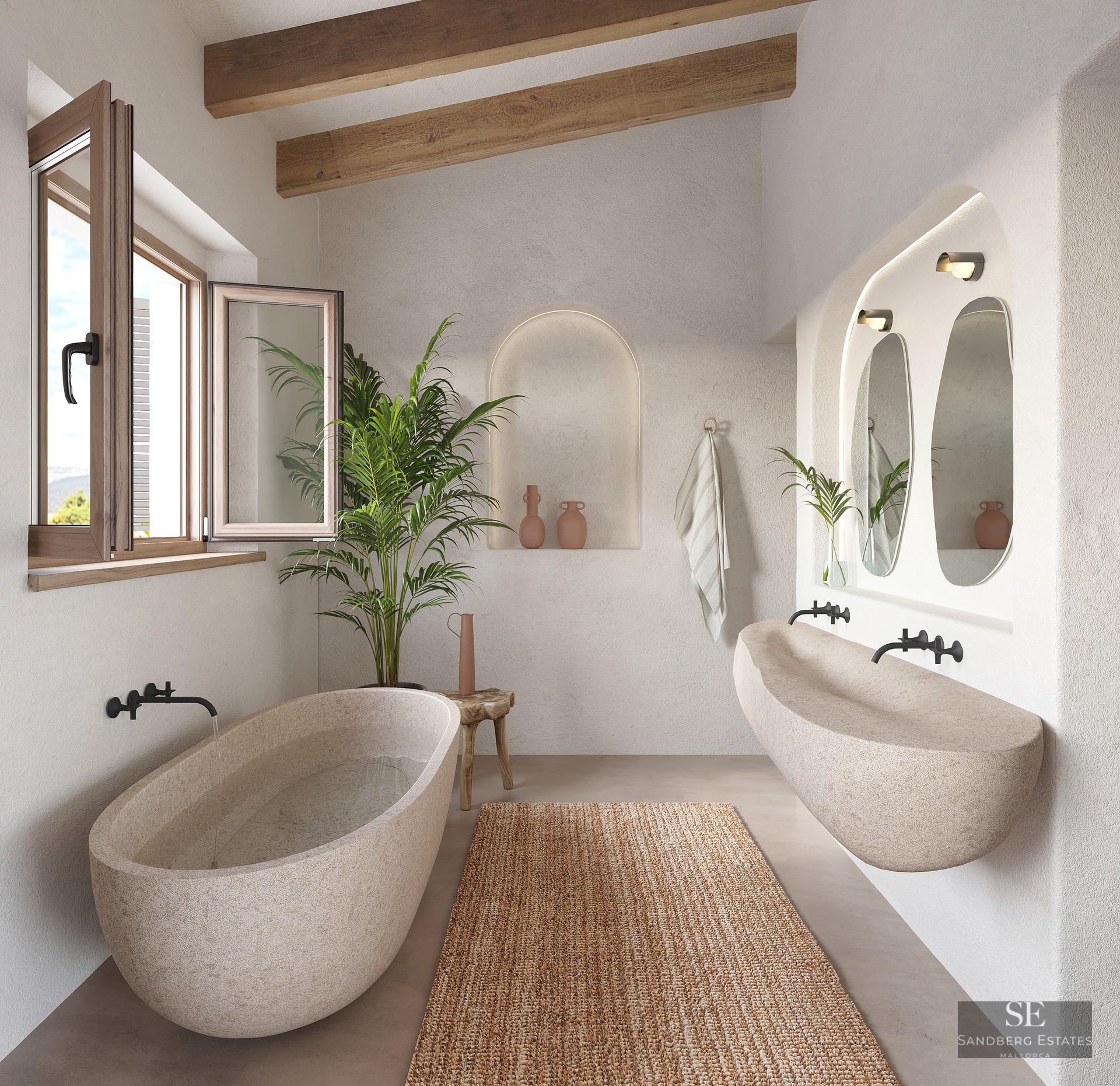 Carved stone bathtub and long stone sink in a bathroom with exposed wooden beams, plaster walls, and an arched niche.