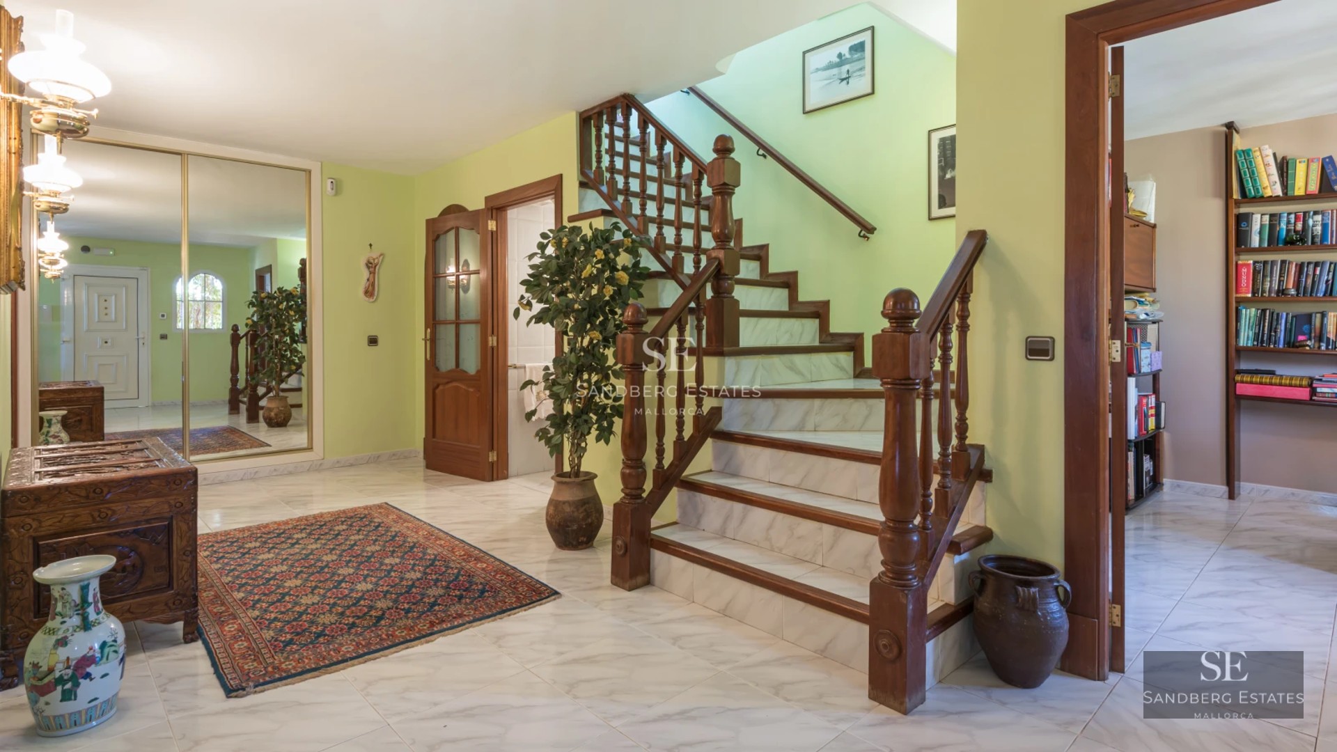 Spacious terrace with pool, sun loungers, and panoramic views. Modern design with elegant furniture. Natural lighting.