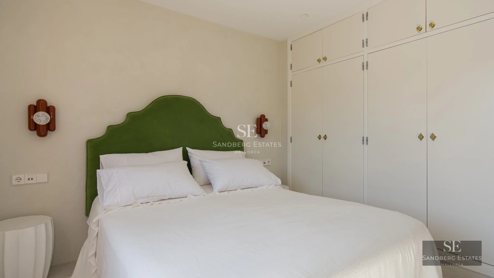 Spacious terrace with infinity pool offering panoramic sea views. Modern design, elegant furniture and lush vegetation.