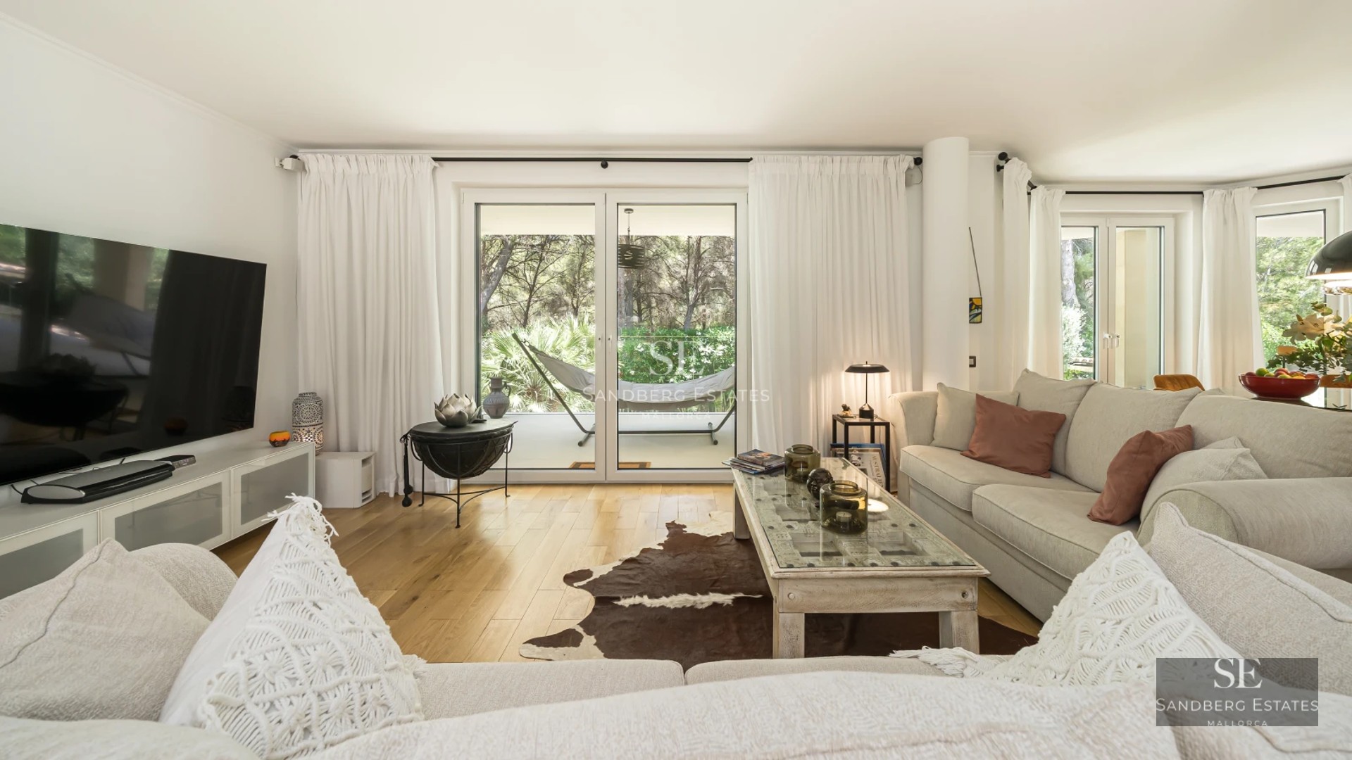 Exterior view of a modern villa featuring an infinity pool, expansive terraces, and lush gardens. Minimalist architecture and avant-garde design.