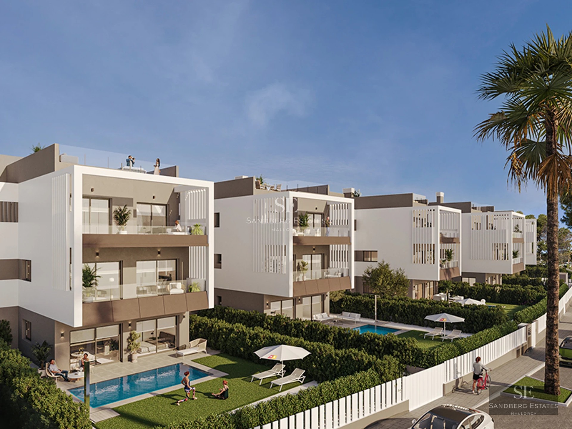 Bright living room with large windows, modern fireplace, and designer furniture. Light wood floors and minimalist decoration.