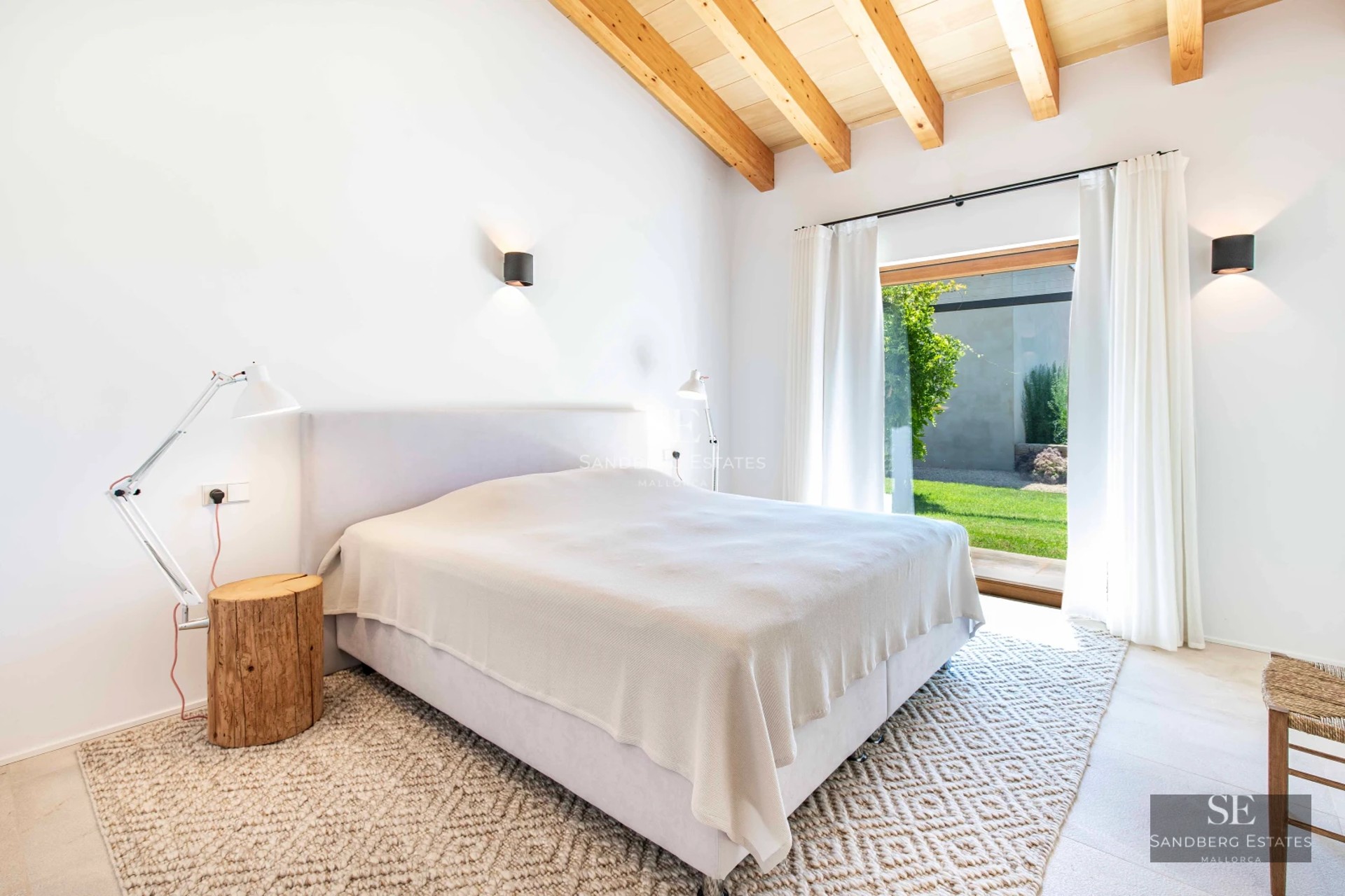 Pool view illuminated at dusk. Modern architecture, clean lines, reflective pool, soft lighting, luxury and comfort.