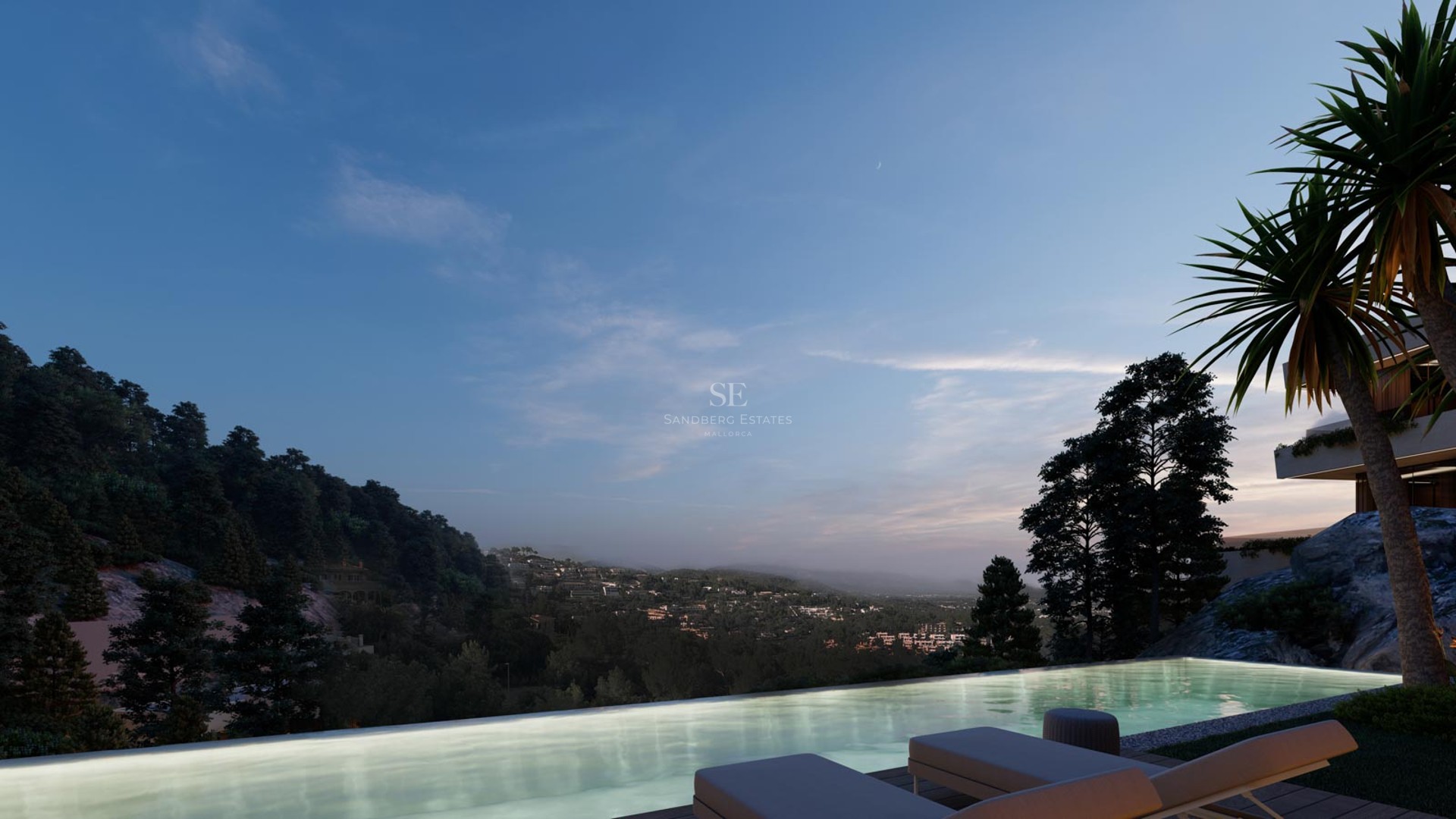 An illuminated infinity pool overlooking a forested valley and distant hills during twilight with sun loungers.