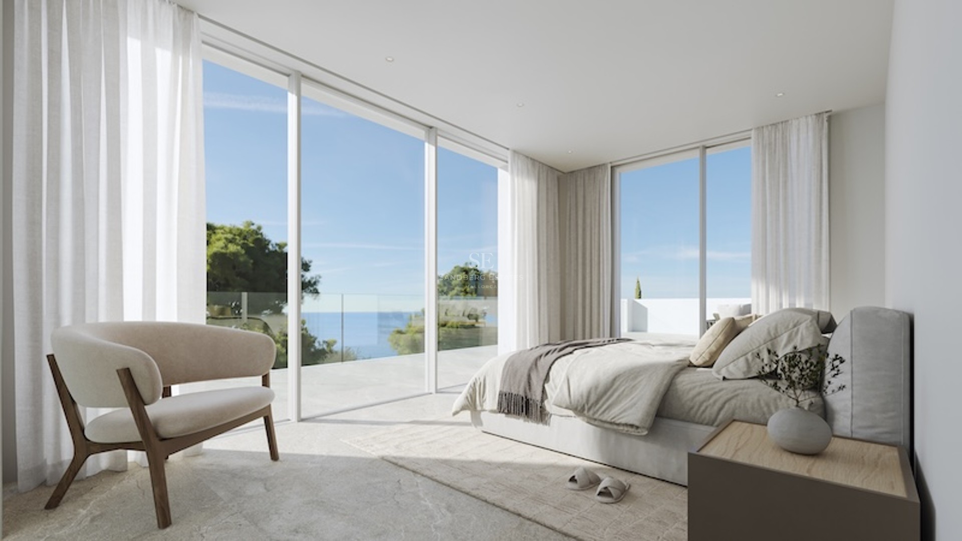 Chambre principale minimaliste dotée de baies vitrées du sol au plafond s'ouvrant sur une terrasse en pierre avec vue mer.