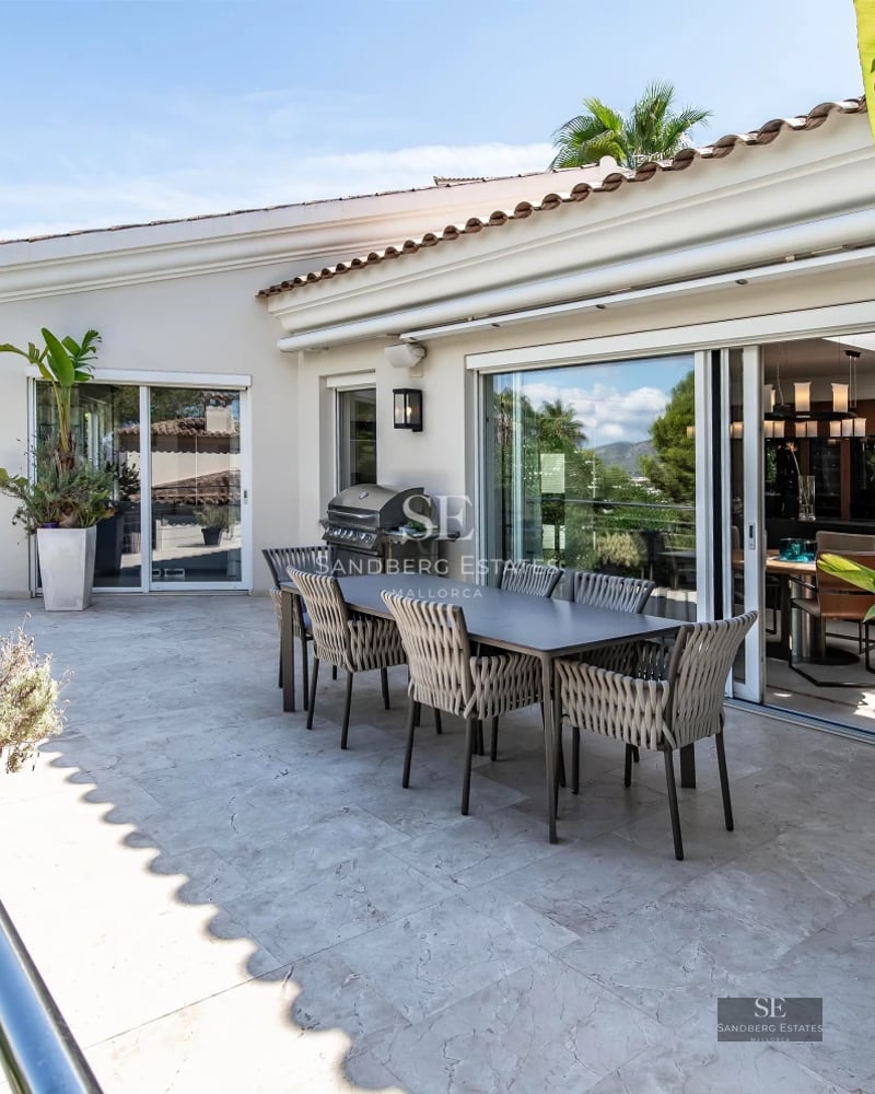 Expansive terrace with pool and sea views. Modern architecture with sleek finishes and designer outdoor furniture.