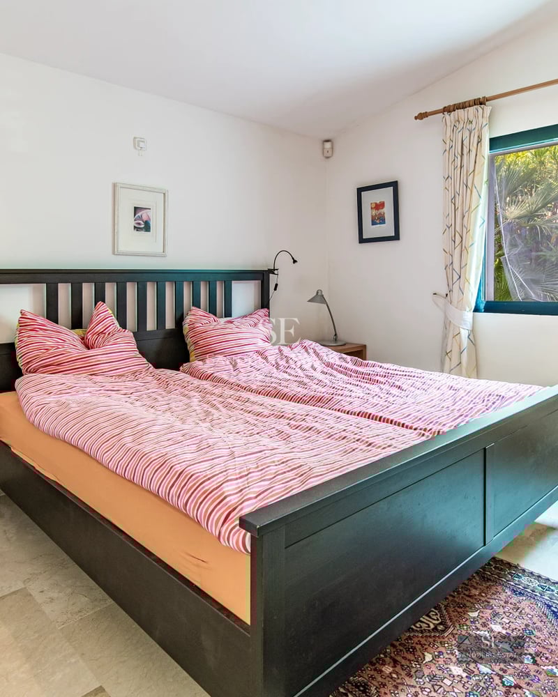 Spacious terrace with infinity pool, panoramic views, and designer furniture. Ambient lighting creates a relaxing atmosphere.