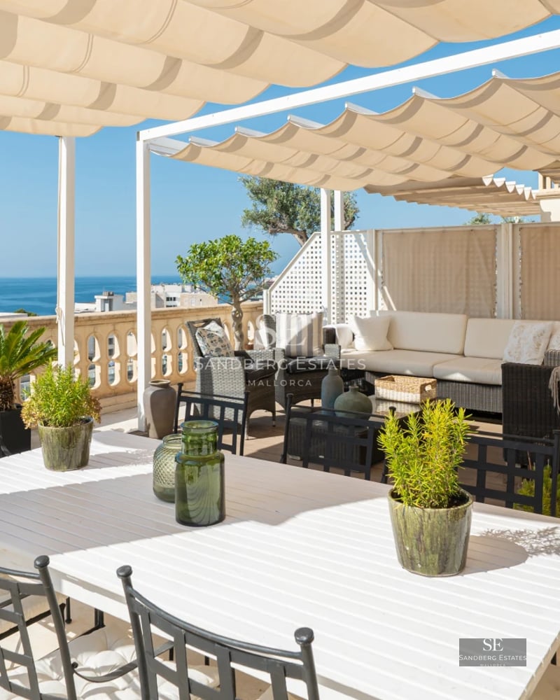 Image of a modern villa featuring an infinity pool, spacious terraces, sun loungers, and panoramic views. Minimalist architecture and elegant design.