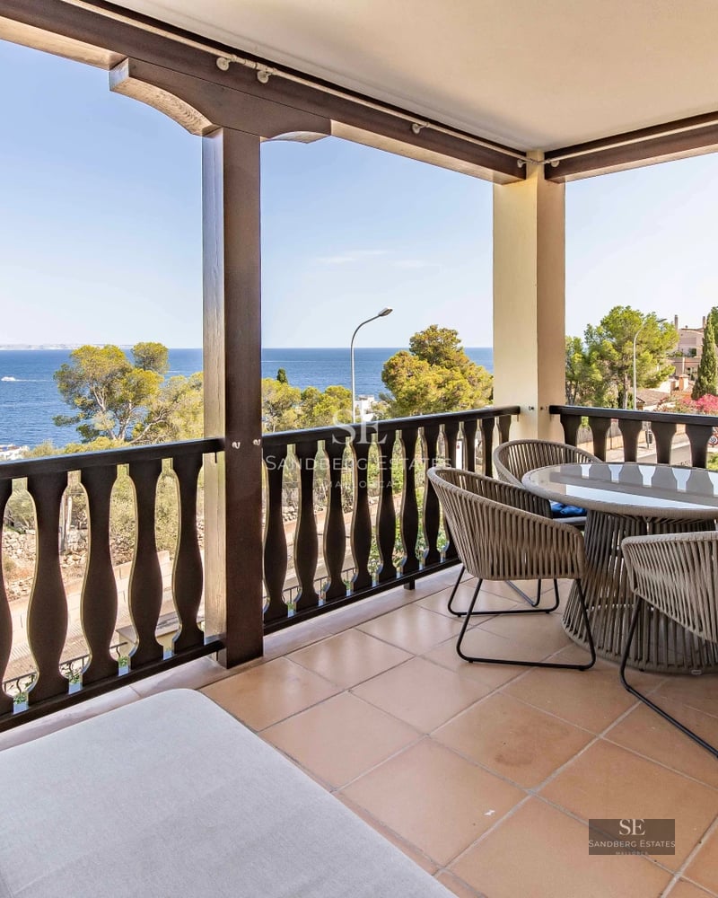 Modern apartment with balcony and sea view. Minimalist design, elegant furniture and abundant natural light.