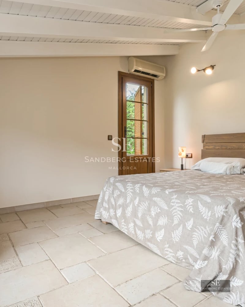 Expansive terrace with infinity pool, panoramic views, modern furniture and lush vegetation. Minimalist architectural design.