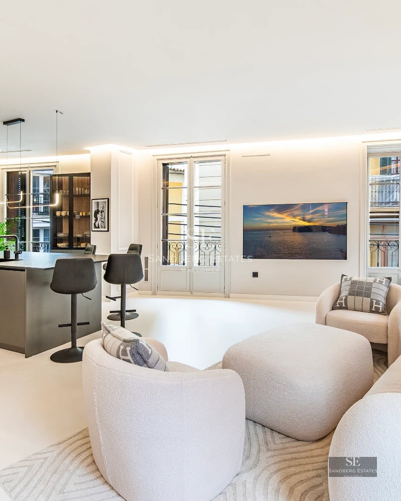 Exterior view of a modern villa with infinity pool, manicured garden, and large windows. Minimalist and elegant architectural design.