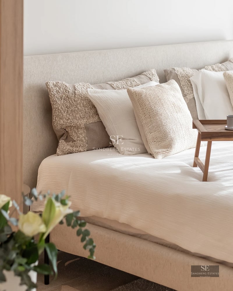 Exterior view of a modern villa with a pool, lush garden, large windows, and minimalist architecture. Contemporary and elegant design.