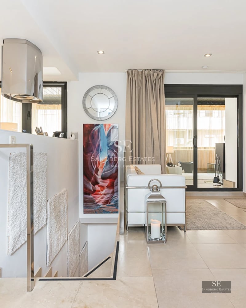 Modern facade with infinity pool, lush garden, and spacious terraces. Minimalist architecture with high-quality finishes.