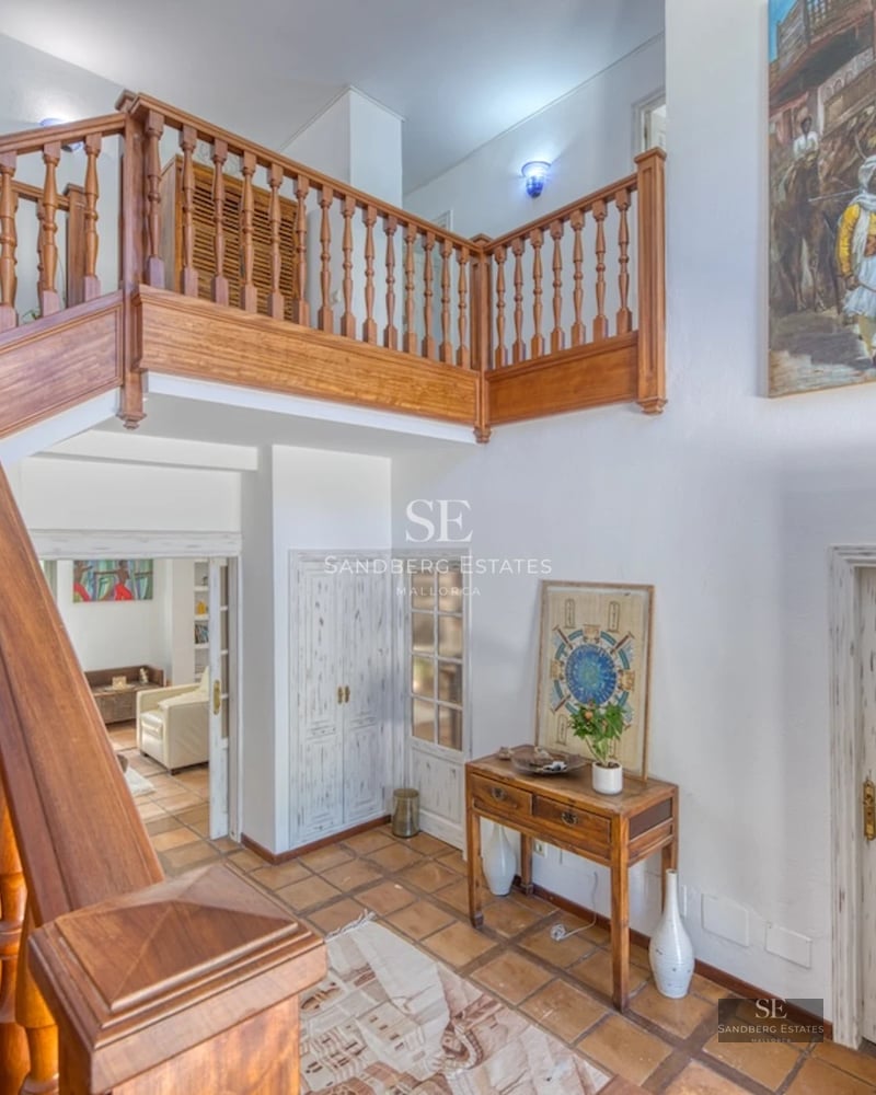 Expansive terrace with infinity pool, panoramic views, and modern furniture. Minimalist design with abundant natural light.