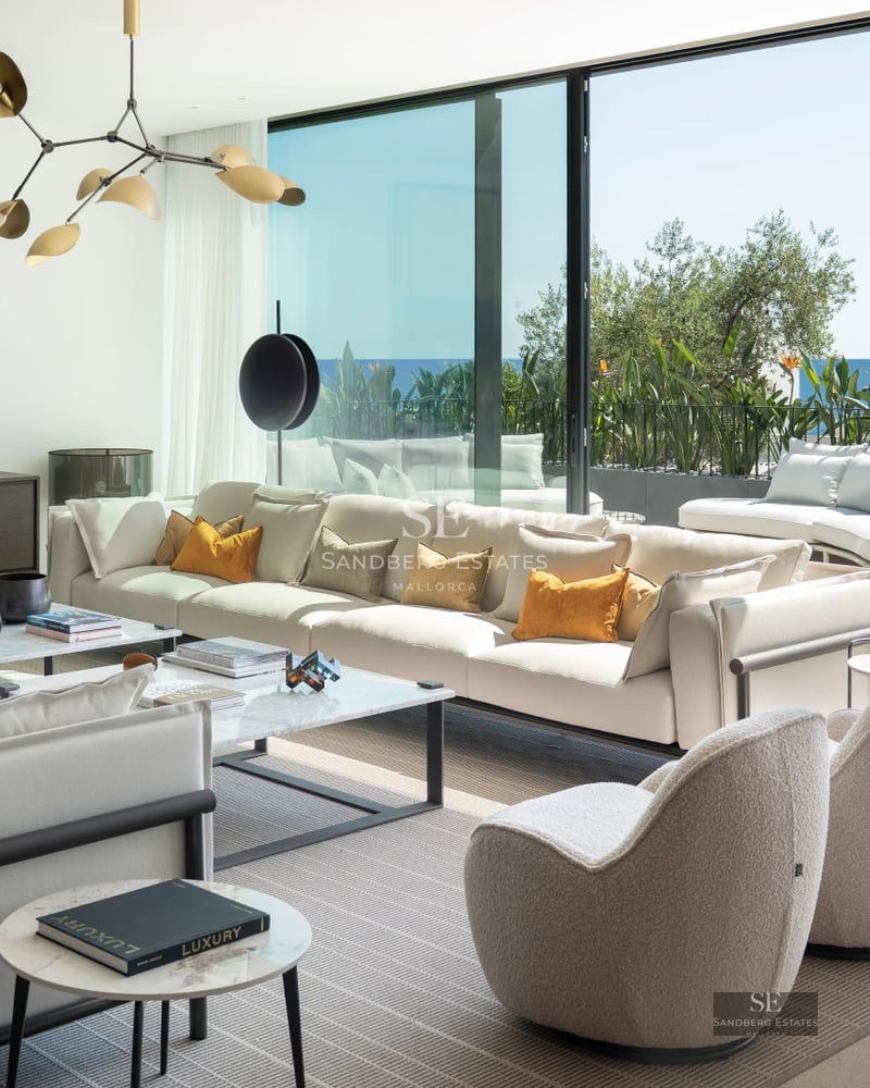 Exterior view of a modern villa with a pool, lush garden and extensive outdoor living areas. Contemporary design.