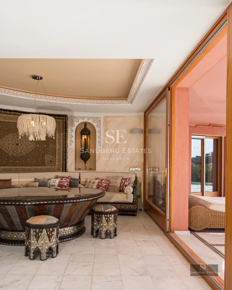 Exterior of a modern house with infinity pool. Sleek design, large windows, and manicured garden. Ambient lighting.