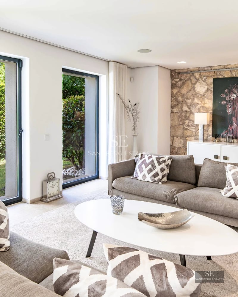 Spacious terrace with infinity pool, sun loungers, and panoramic views. Modern design with clean lines and high-quality materials.