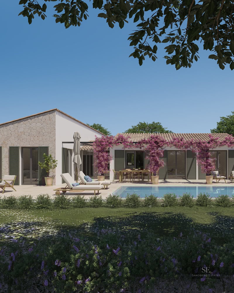 Mediterranean stone villa featuring a turquoise pool, sun loungers, and purple bougainvillea under a clear blue sky.