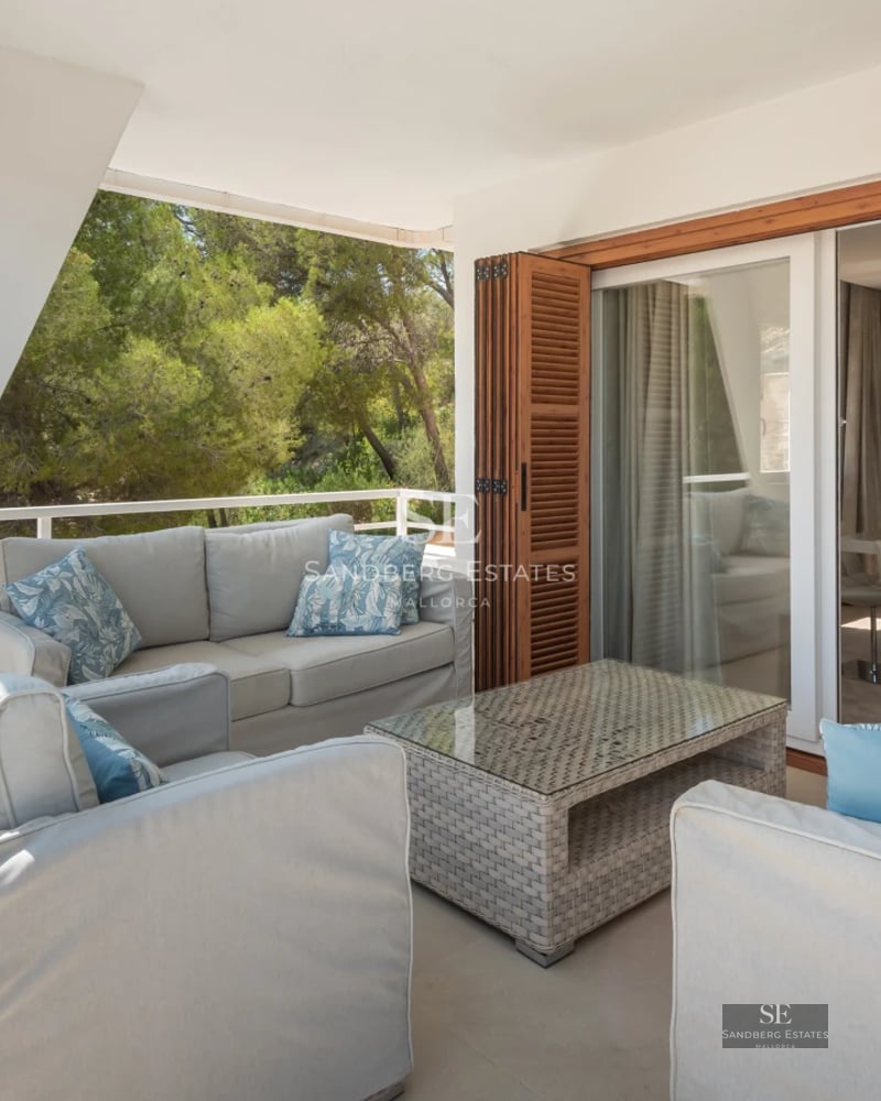 Aerial view of modern home with infinity pool, lush garden, and minimalist architecture. Elegant and sophisticated design.
