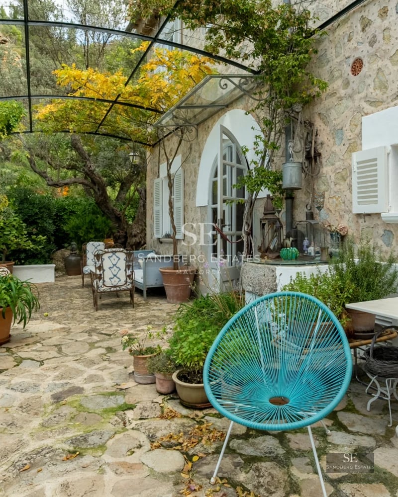 Exterior view of a modern villa with a pool, manicured lawn, and large windows. Minimalist architecture and contemporary design.