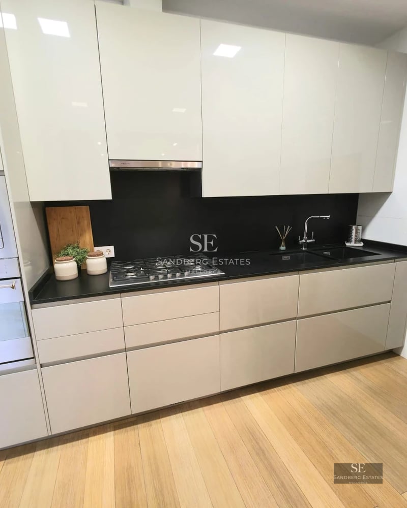 Exterior view of a modern villa with an infinity pool, lush garden, and expansive terraces. Minimalist architecture with clean lines.