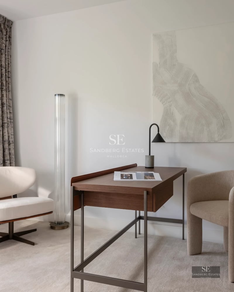 Bright living room featuring large windows, light wood floors and modern furniture. Breathtaking views. Elegant design.