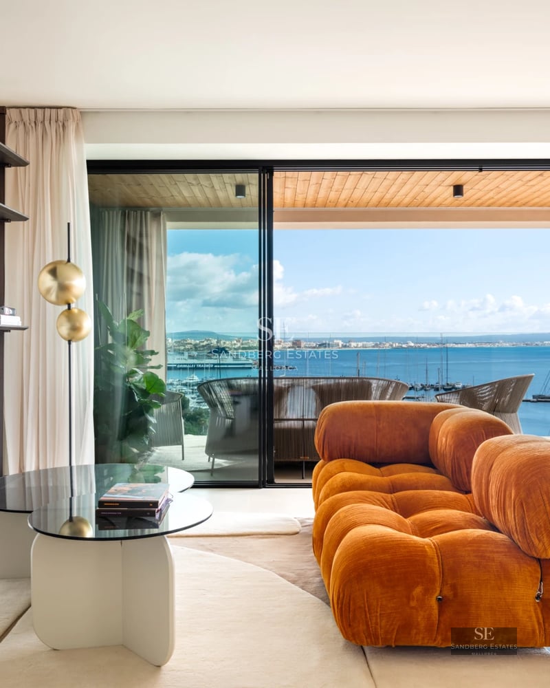 Exterior view of a modern villa with pool, large windows, and lush landscaping. Minimalist architecture with luxury touches.