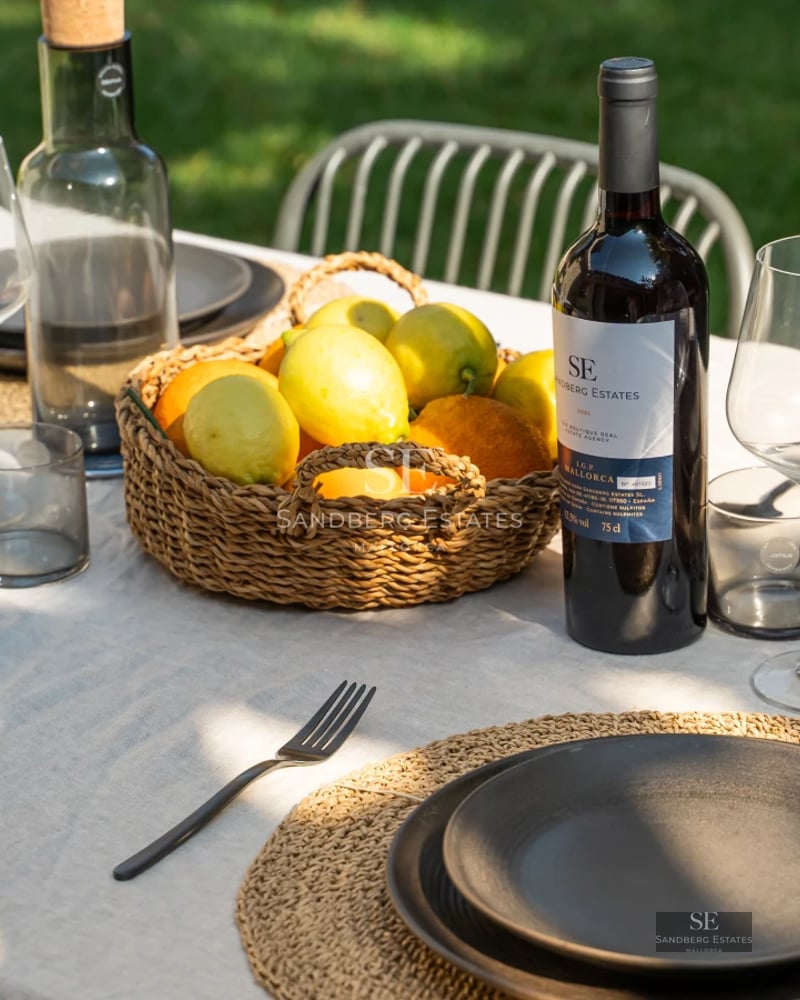 Expansive terrace with pool and panoramic views. Modern design, elegant sun loungers, and lush greenery.