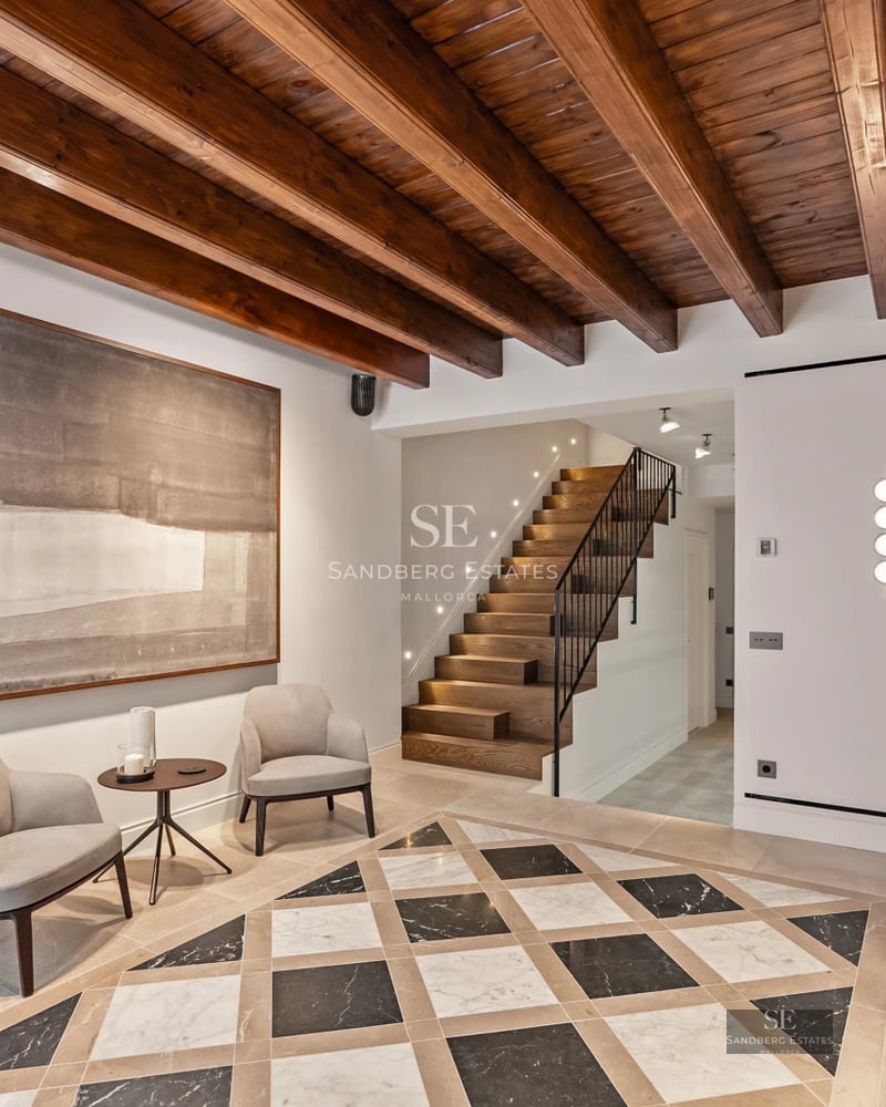 Spacious terrace with infinity pool, sun loungers, and panoramic views. Modern architecture with clean lines and floor-to-ceiling windows.