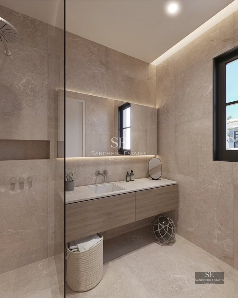 Pool view with crystal clear water, surrounded by vegetation and a modern building in the background. Elegant landscaping design.