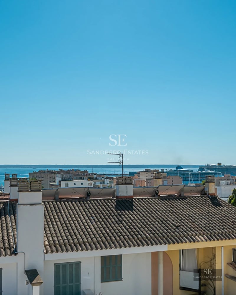 Exterior view of a modern villa with a pool and garden. Minimalist architecture, large windows, and elegant landscaping.