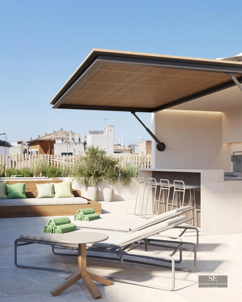 Exterior view of a modern villa with reflecting pool, large windows, and minimalist design. Lush landscaping and blue skies.