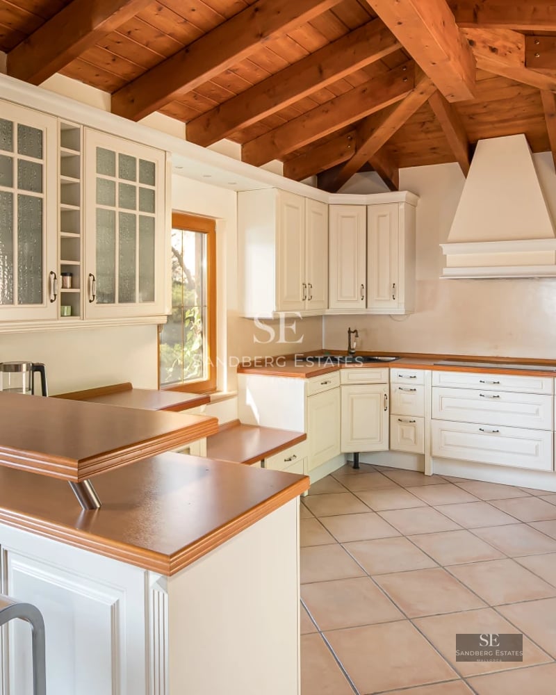 Spacious terrace with a view. Modern furniture, private pool, wooden floors. Perfect for enjoying the outdoors.