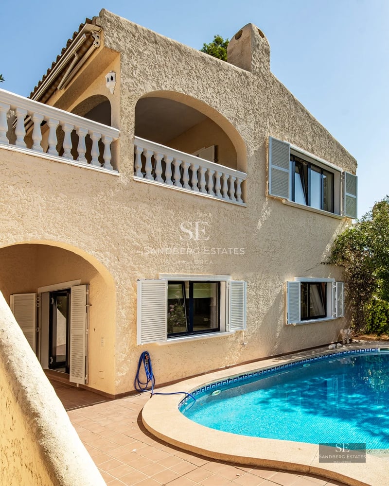 Exterior view of a luxury home featuring a pool, large garden, and modern architecture. Soft lighting, neutral color palette.