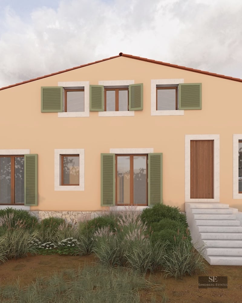 Front exterior of a peach-colored Mediterranean house with green shutters, stone steps, and a white car in the driveway.