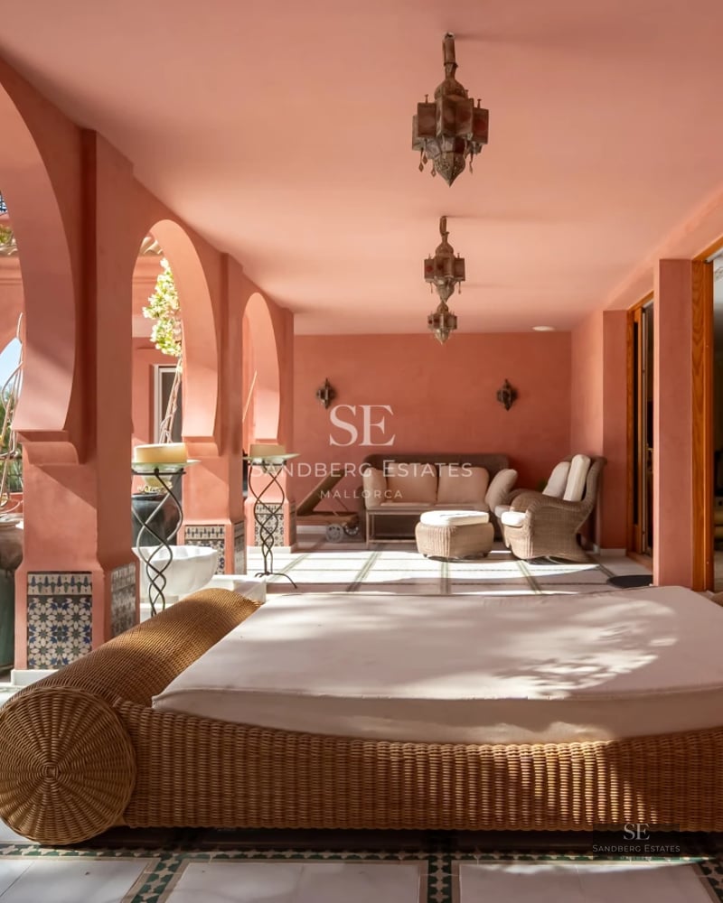 Exterior view of a modern villa featuring an infinity pool, lush garden, and spacious terraces. Minimalist design, natural light.