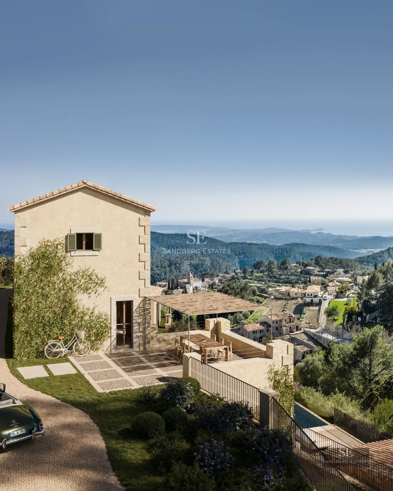 Spacious living room with panoramic windows, modern fireplace and designer furniture. Breathtaking views of the city.