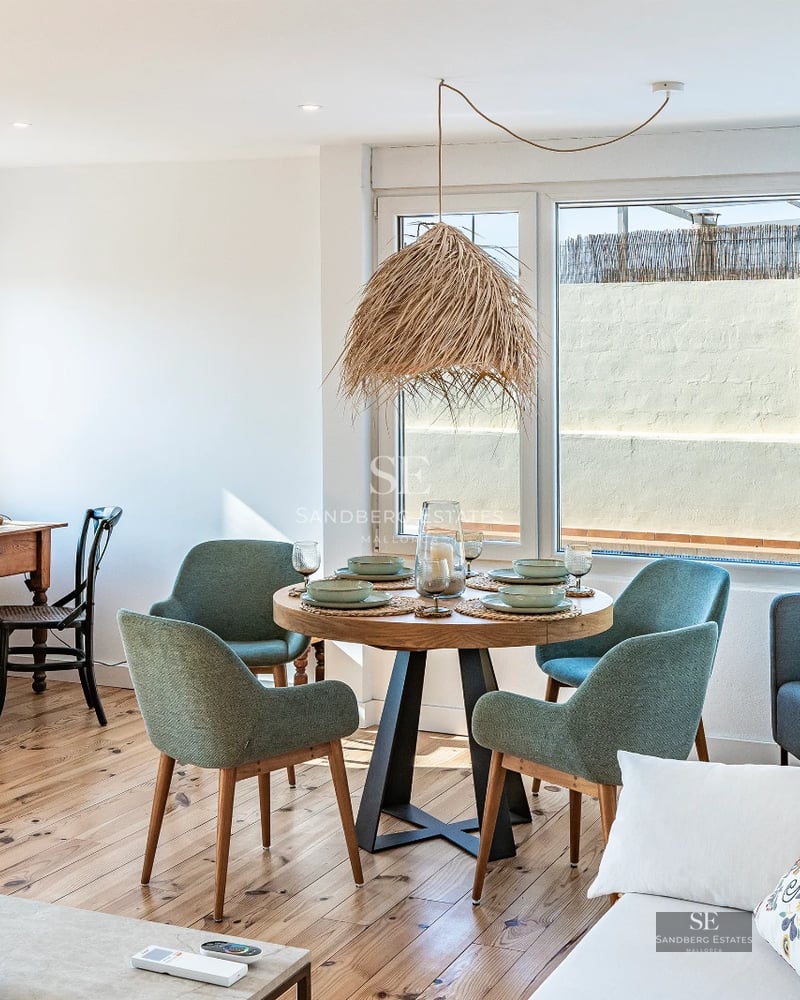 Modern facade with reflecting pool and large windows. Minimalist architecture and elegant design with ambient lighting.