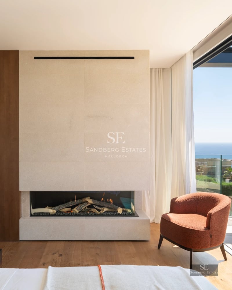 Spacious living room with floor-to-ceiling windows, outdoor pool, and panoramic views. Modern design with high-quality finishes.